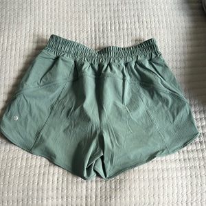 Lululemon Track That Mid Rise Lined Short 5” in a Teal color